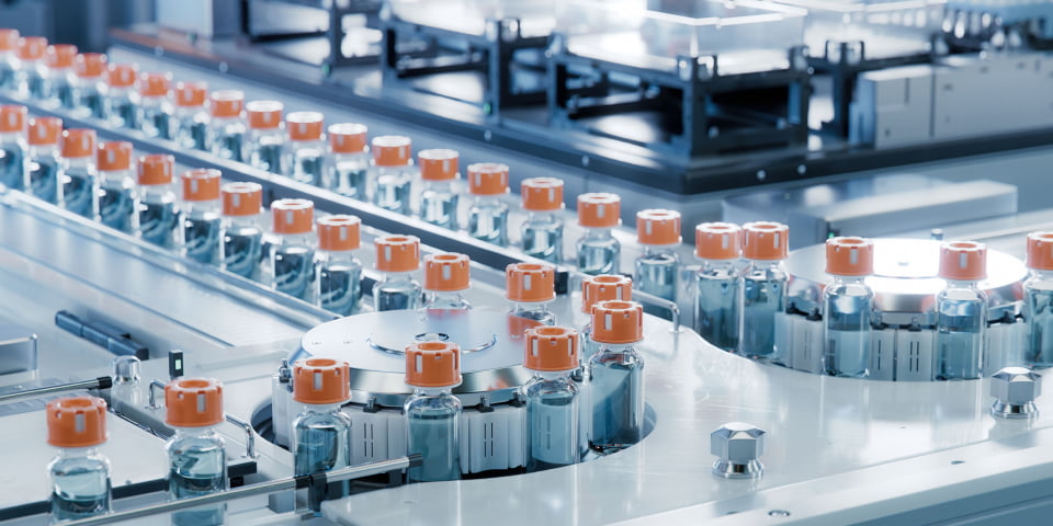 A production line of small glass vials